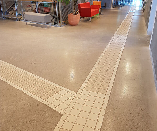 tactile guide lines in flooring. Photo.
