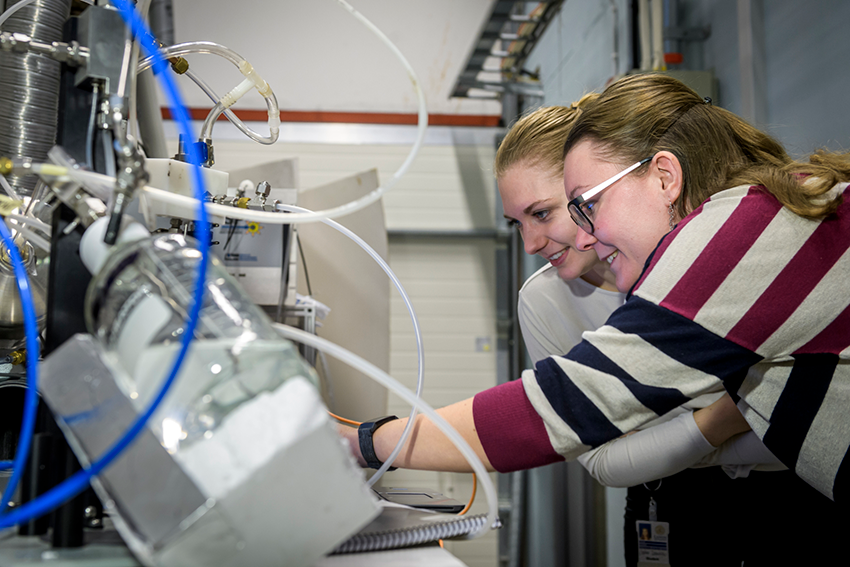 Two researchers in a laboratory.